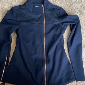 Navy blue with rose gold zipper details